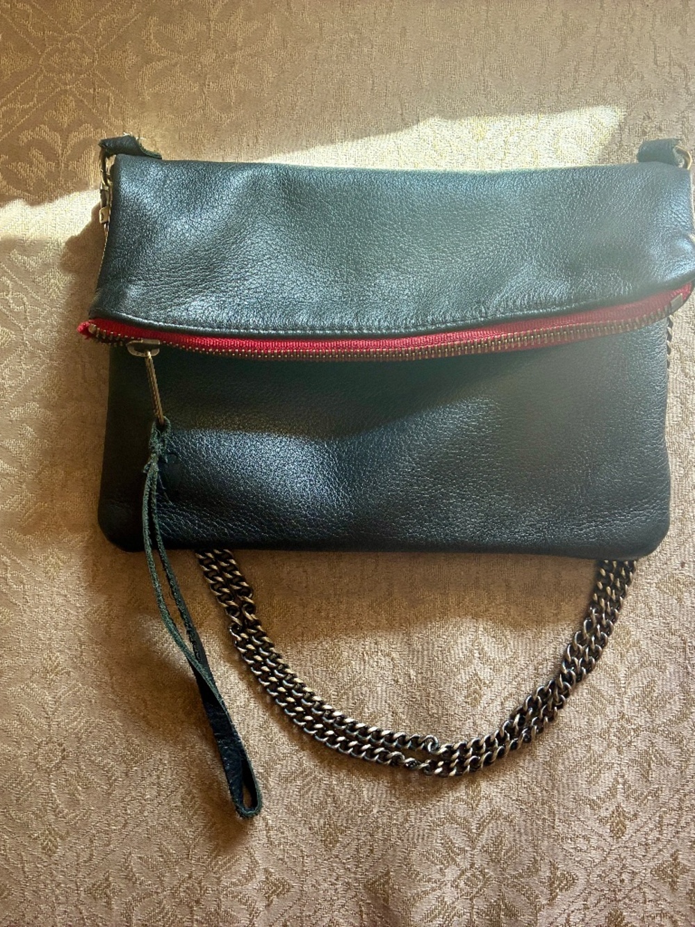 Beautiful black leather bag with chain handle & red zipper